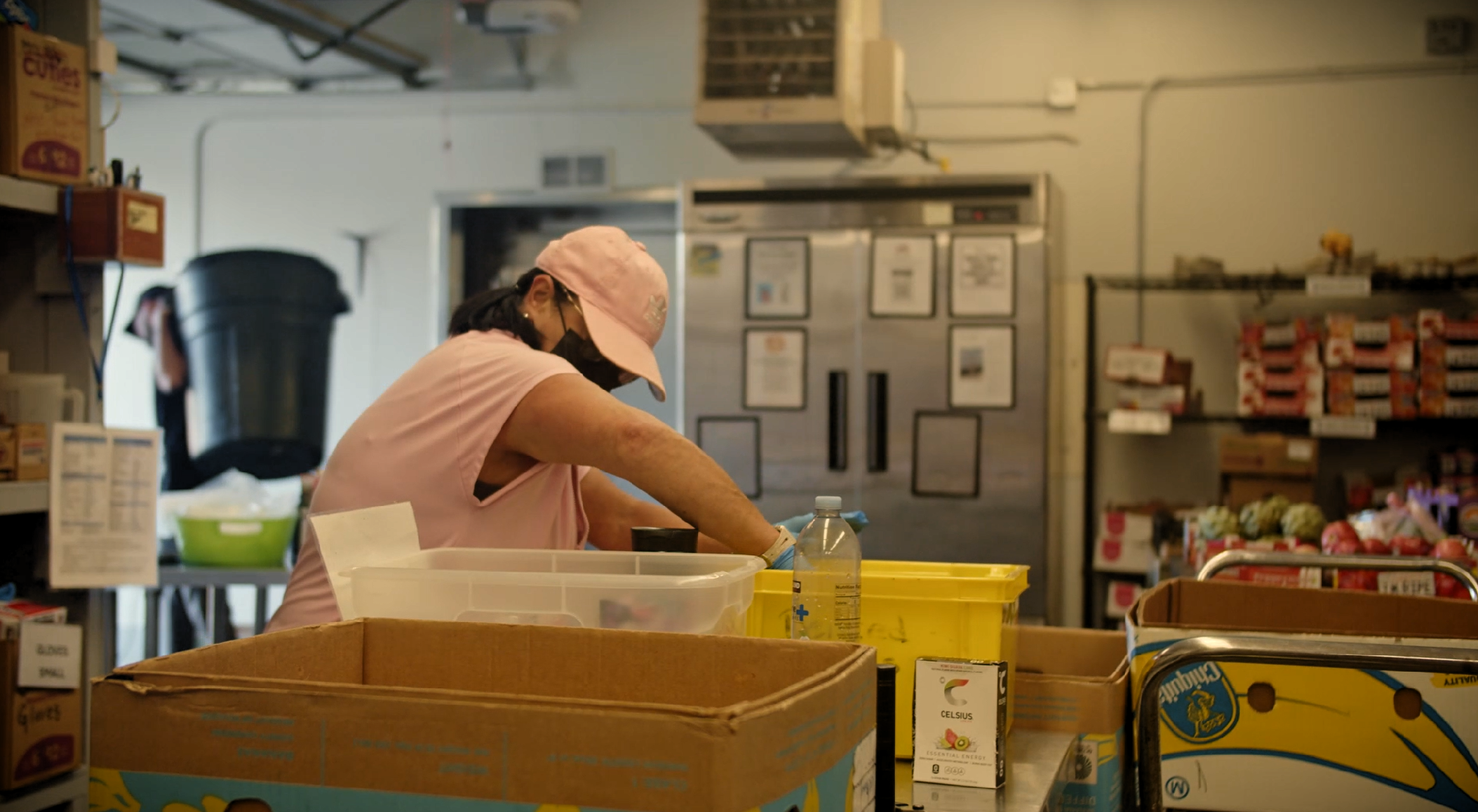 Volunteers and Staff sorting grocery rescue food