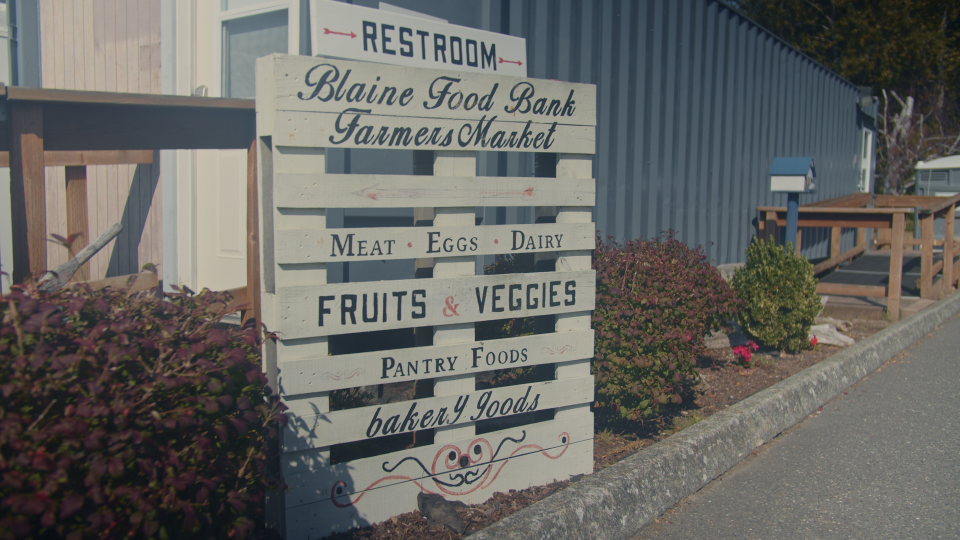The Sign outside of the Blaine Food Bank that lists some of the many items available for guest at the food bank.